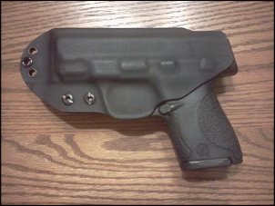 Click image for larger version

Name:	Multiholster1.jpg
Views:	595
Size:	24.2 KB
ID:	9043