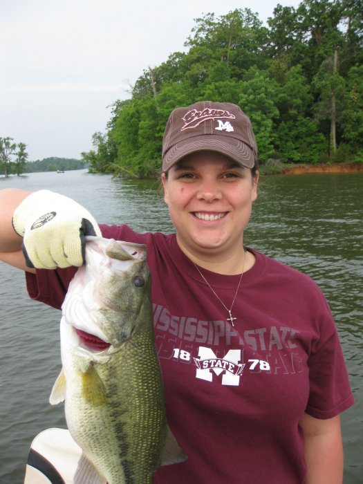 You'd never guess that I'd just shoved a treble hook in her foot, and that it's still there, would you? All she was worried about was getting that fish in the boat.
